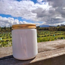 Load image into Gallery viewer, Candle with the strongest scent you can find, lavender to calm and sooth the senses